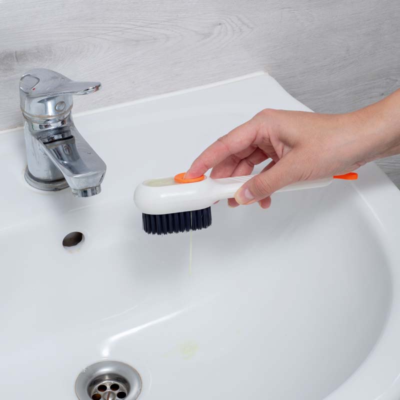 Perie cu dozator de lichid