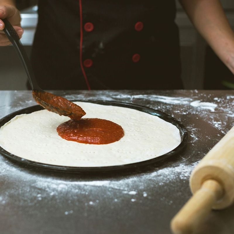 Formă pentru pizza perforată cu strat de teflon